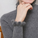 Celia Ribbed Turtleneck Sweater with Ruffled Cuffs in Grey