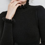 Celia Ribbed Turtleneck Sweater with Ruffled Cuffs in Black