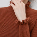 Celia Ribbed Turtleneck Sweater with Ruffled Cuffs in Rust