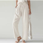 Gretel High-Waisted Pleated Wide-Leg Trousers with Tie in White