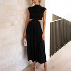 Ilaria Pleated Midi Dress with High Neck and Open Back in Black