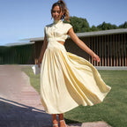 Ilaria Pleated Midi Dress with High Neck and Open Back in Yellow