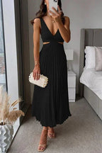Pleated Midi Dress with V-Neck and Waist Cut-Out in Black